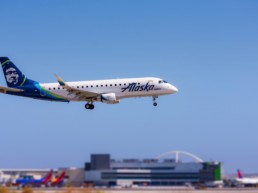 Photo of an Alaska Airlines Airplane Flying During the Day